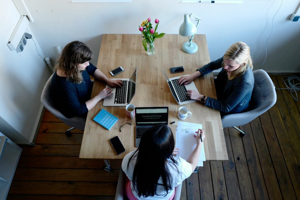 3 women collaborating